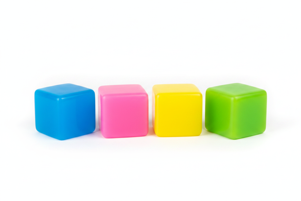 Clean minimalist shot of squishy cube toys in multiple colors